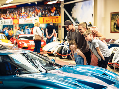 Family In Hall Of Motorsport at Haynes Motor Museum