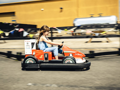 Child playing on a junior go kart at Haynes Motor Museum